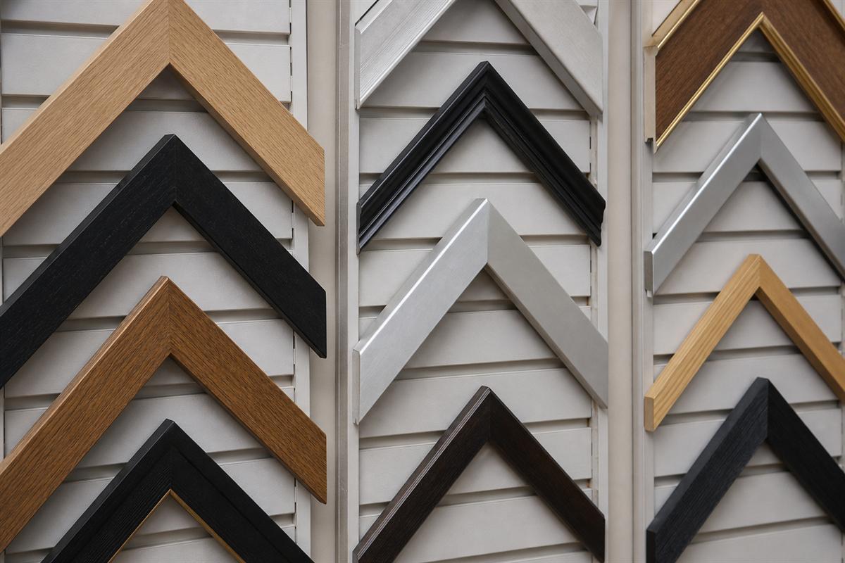 Gallery wall of mixed frame profiles